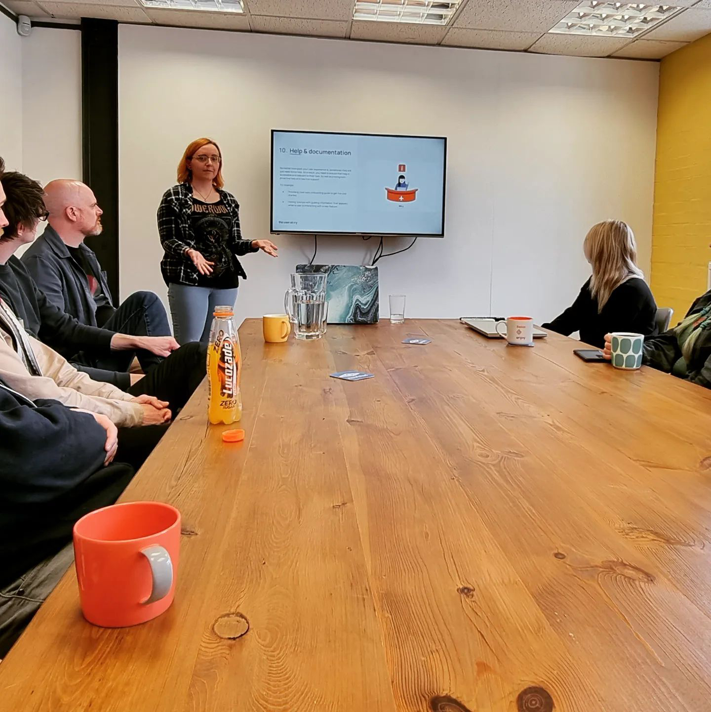 A knowledge share presentation in the board room