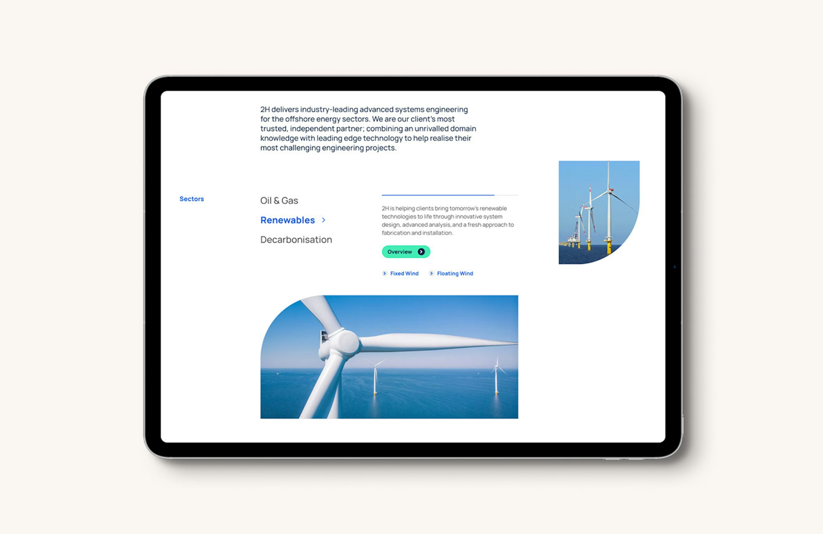 A section of the 2H website homepage displayed on an Ipad tablet computer