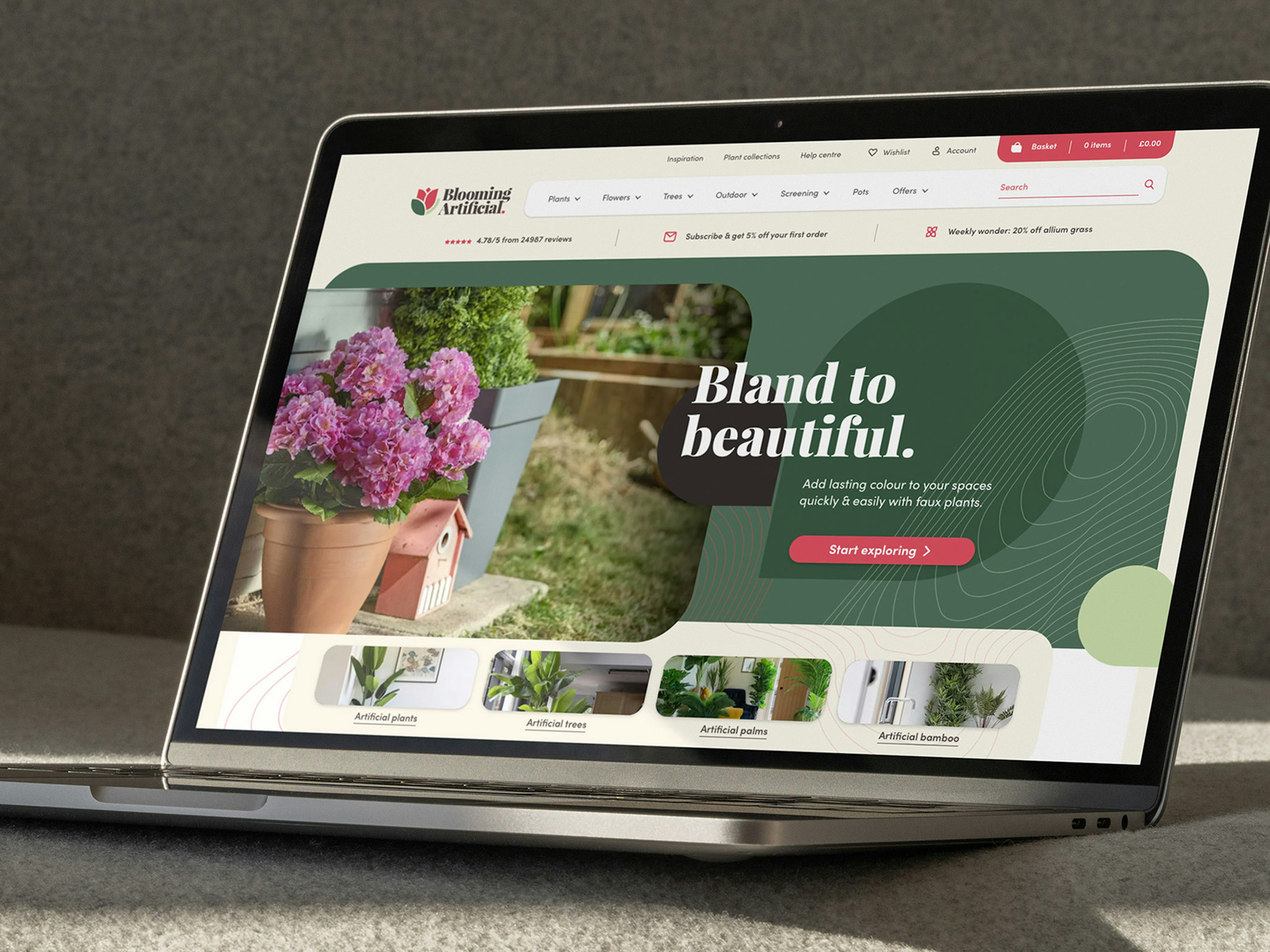 A laptop displaying the Blooming Artificial website, featuring a promotional banner for artificial plants with the slogan