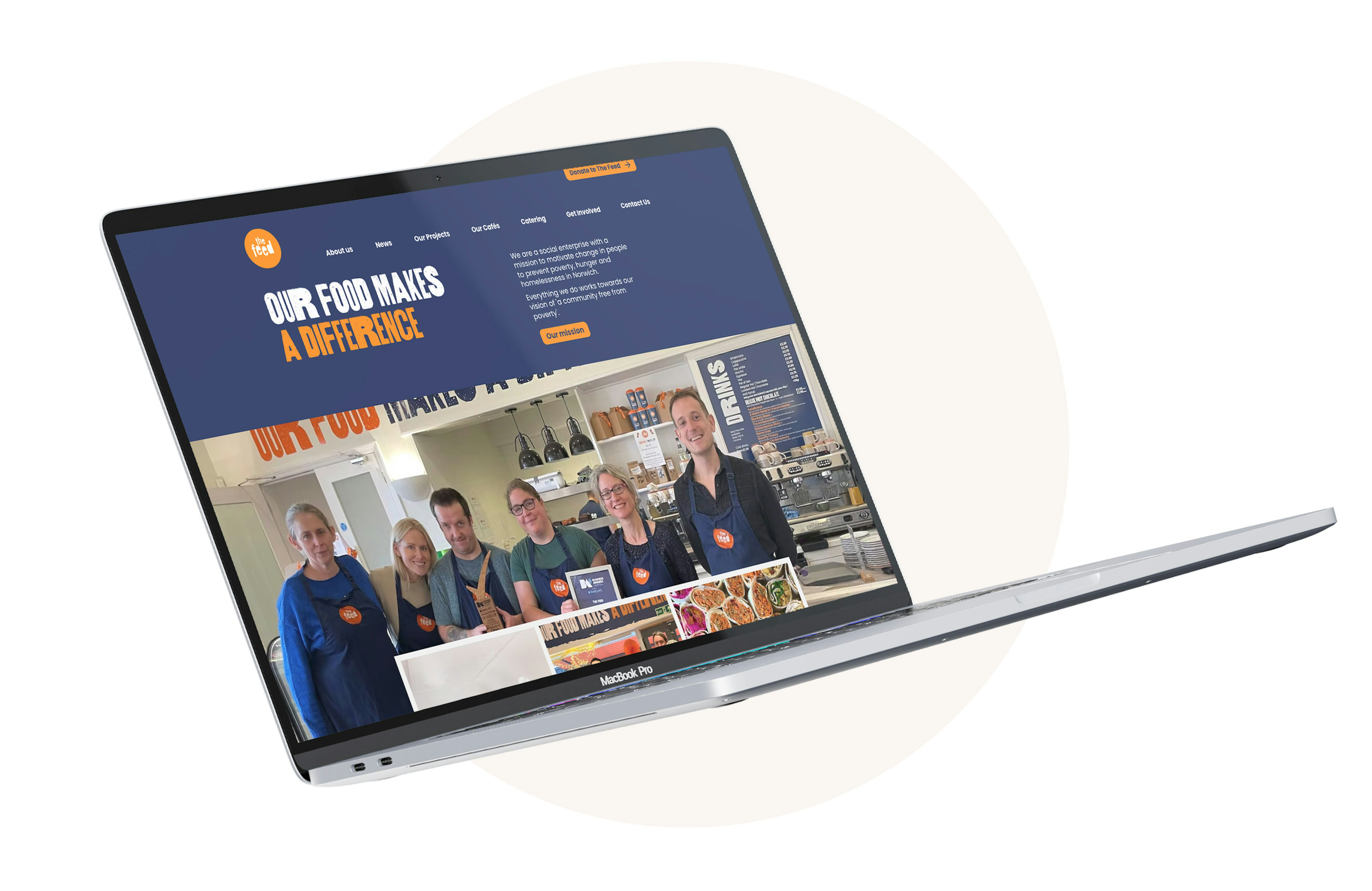 An open laptop computer showing the hompage of the Feed website