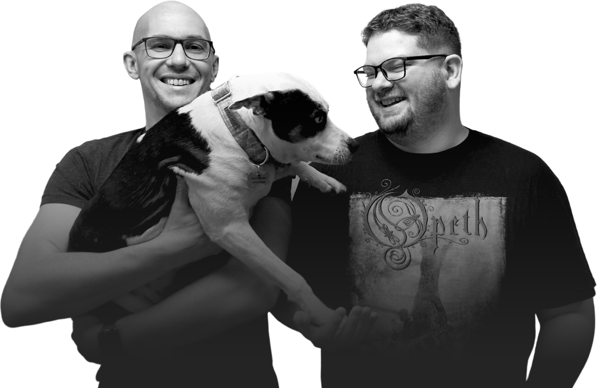 Mark Williams-Cook (holding Snoop the dog) and Jack Chambers-Ward standing together, smiling. Jack is wearing an Opeth t-shirt. They are a cool Scandinavian metal band, apparently.