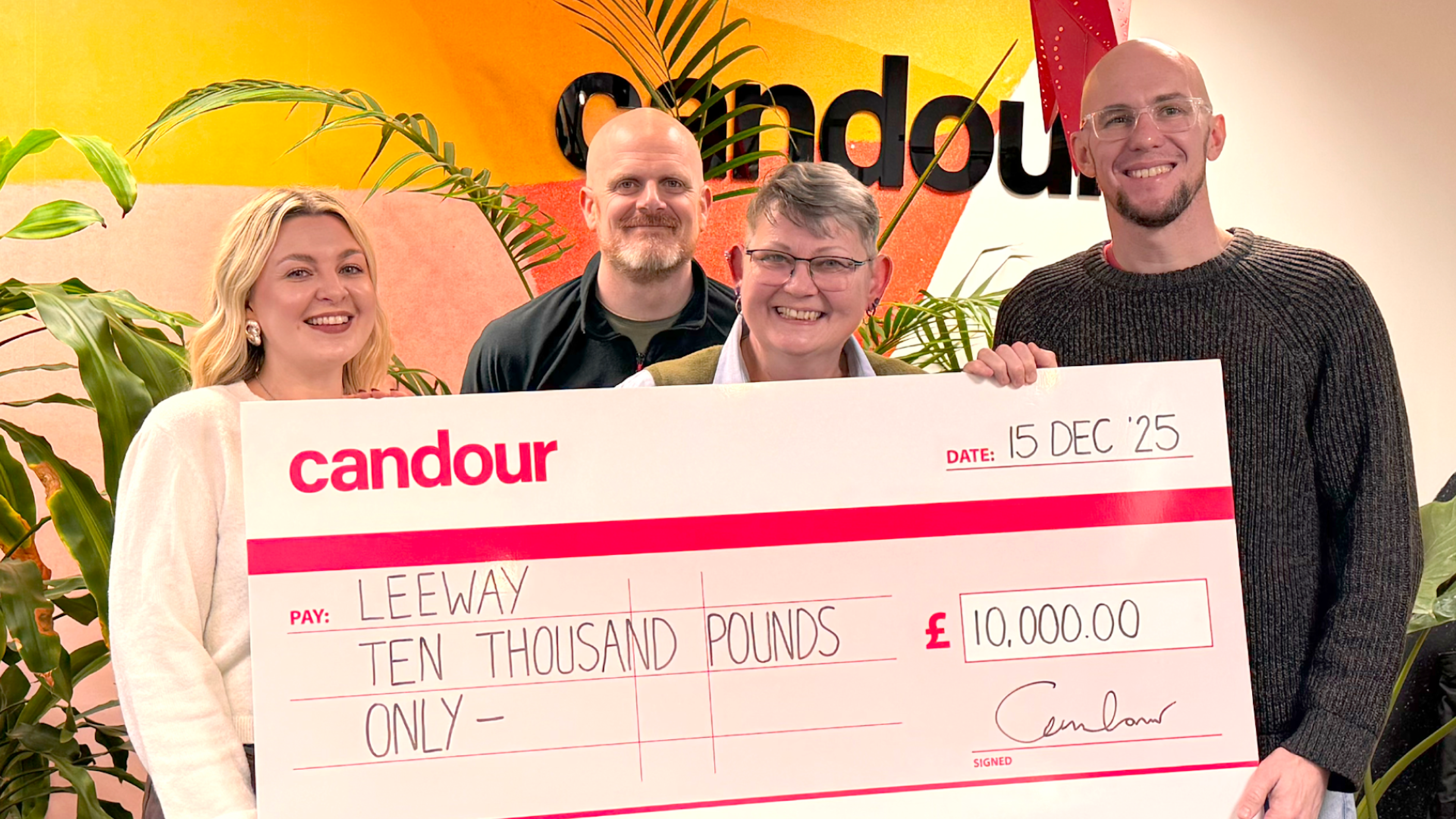 Jessica Bettis, John Skinner, Jools Ramsey-Palmer and Mark Williams-Cook holding a large cheque made out to Leeway for ten thousand pounds