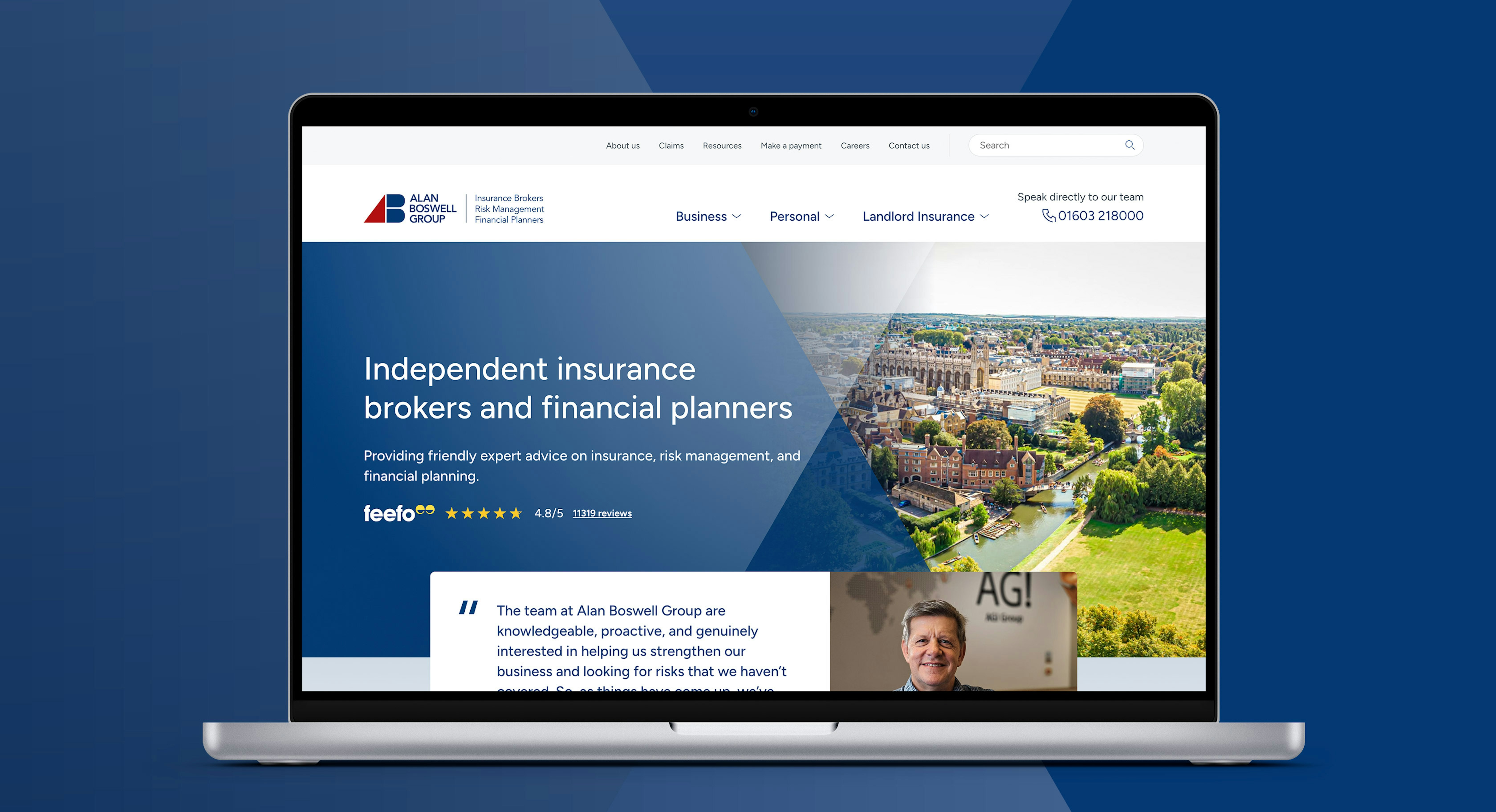 A laptop computer displaying the new Alan Boswell Group website homepage