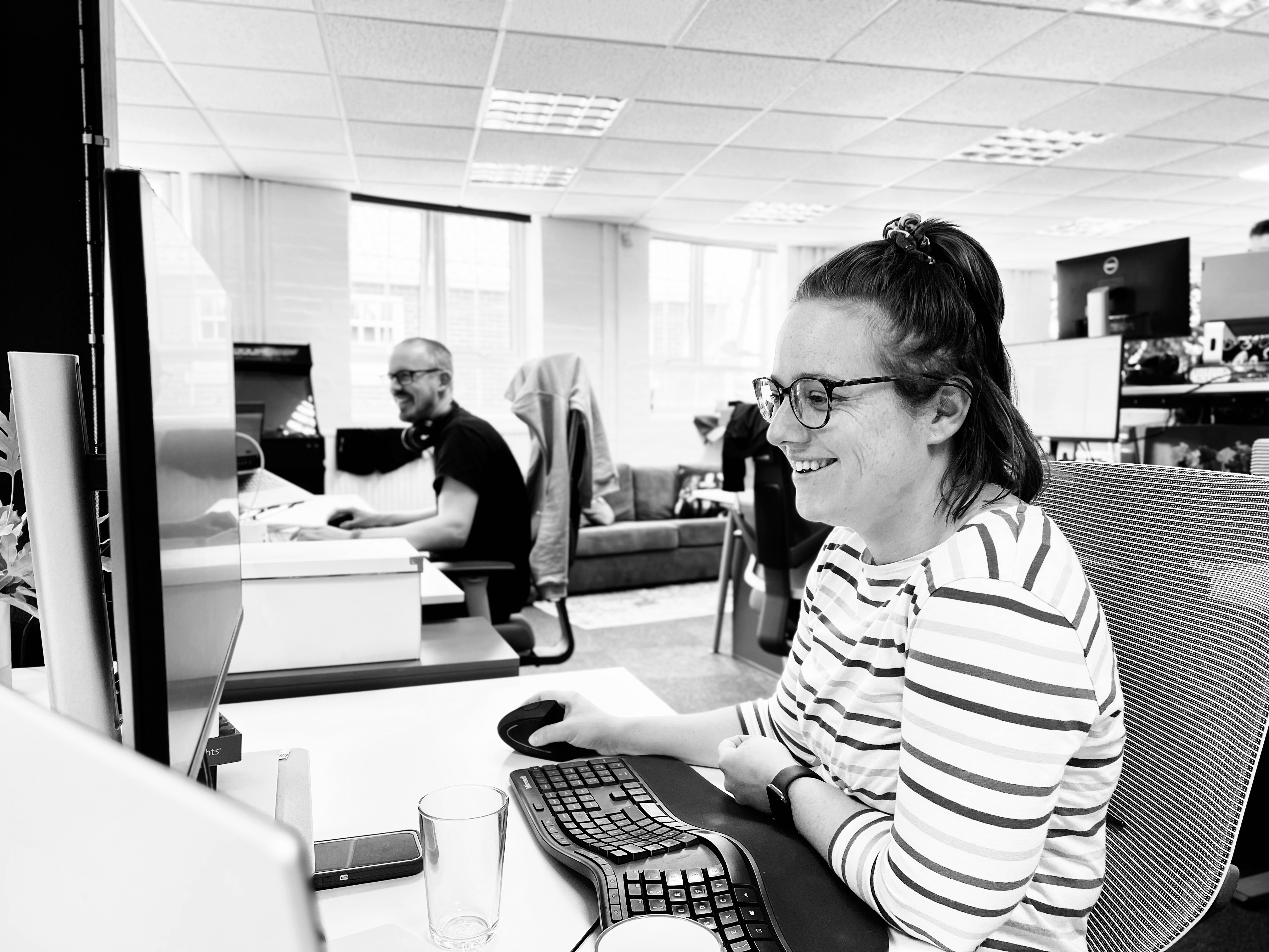 People working at Candour looking happy